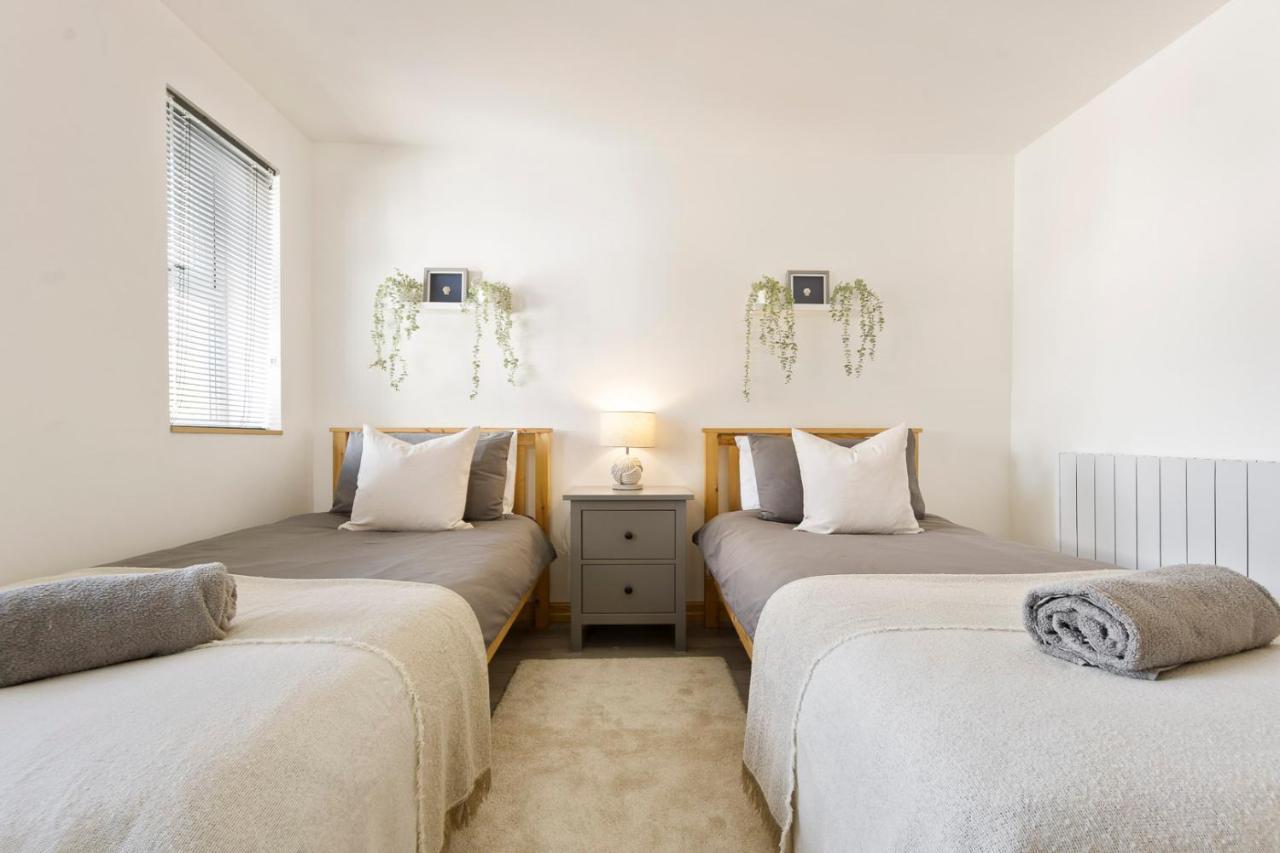 Coastal Charm Townhouse: Renovated 3-bedroom With Parking *
